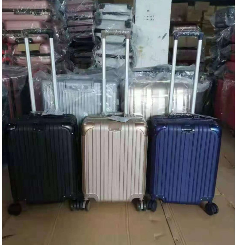 ใหม่ล่าสุด กระเป๋าเดินทาง ABS + PC Universal Wheel Zipper Trolley กล่องลากหนังกล่องรหัสกล่องกระเป๋าเดินทาง Wholesale