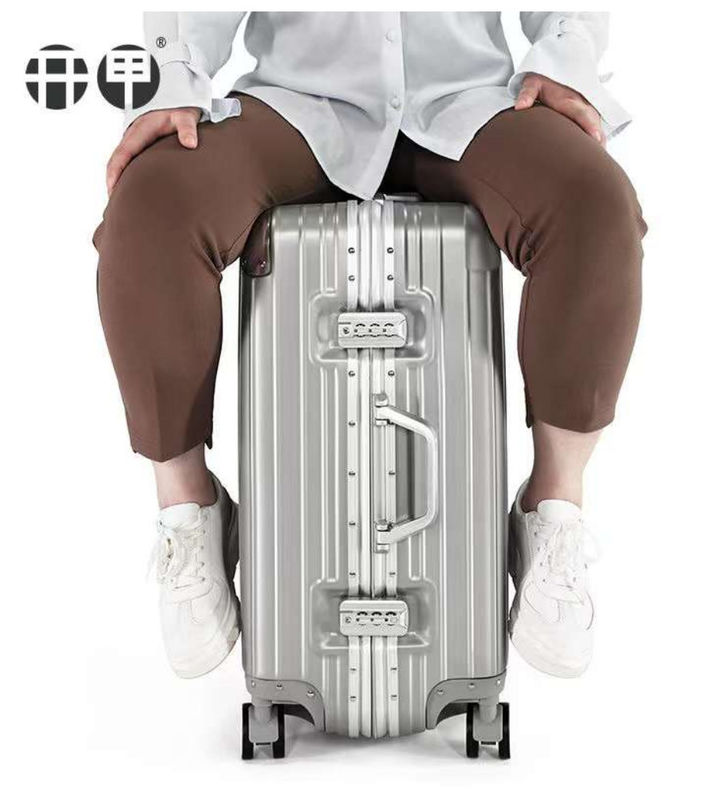 ใหม่ล่าสุด กระเป๋าเดินทาง ABS + PC Universal Wheel Zipper Trolley กล่องลากหนังกล่องรหัสกล่องกระเป๋าเดินทาง Wholesale